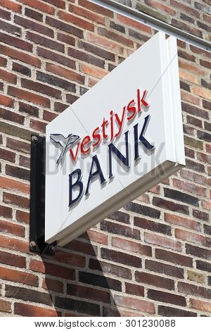 Horsens, Denmark - May 5, 2019: Vestjysk Bank Logo On A Wall. Vestjysk Bank Is The 9th Largest Danis
