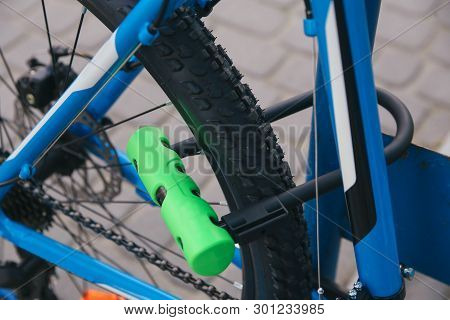 Bicycle Lime Green  U-lock On Bicycle Outdoors