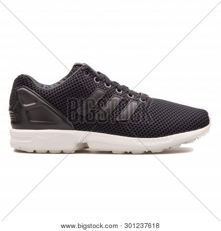 Vienna, Austria - August 10, 2017: Adidas Zx Flux Black Sneaker On White Background.