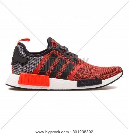 Vienna, Austria - August 10, 2017: Adidas Nmd R1 Red And Black Sneaker On White Background.