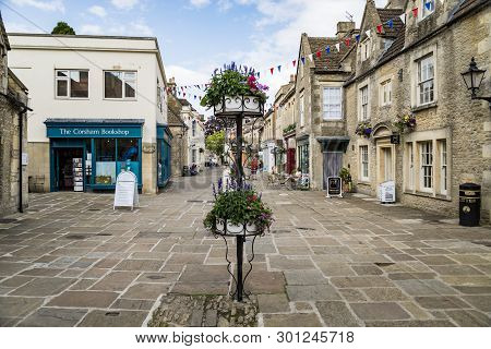 Corsham, Uk - July 17: A Person Rides His Bike In A Street In Corsham, An Old Village In South Of En
