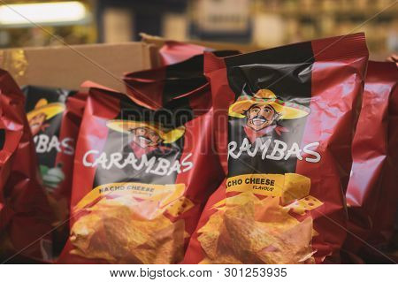 Volzhsky, Russia - Apr 26, 2019: Products Of Hypermarket Sale Of Carambas Corn Chips Beverages In Th