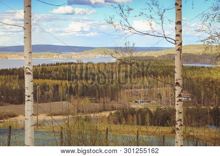 Beautiful Views Of The Mountains To The Lakes, Houses, Birches And Forest. Finnish Landscape. Lakes 