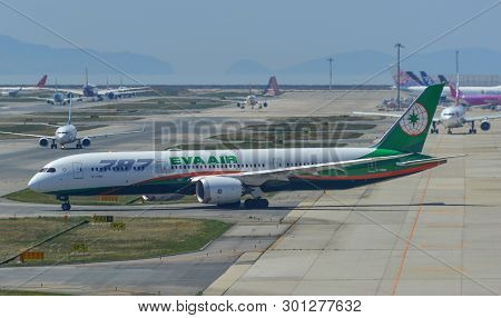 Airplane Taxiing On Runway Of The Airport