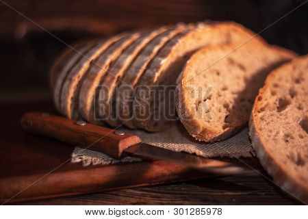 Rural Still Life With Homemade Bread On Rustic Background In The Morning Light