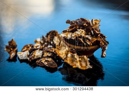 Raw Peeled Tamarind Or Imli In A Clay Bowl On Wooden Surface.
