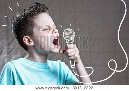 A Boy In A Blue T-shirt Sings Very Loudly Into A Painted Microphone