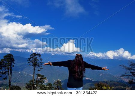 A Woman Standing At Dochula Pass