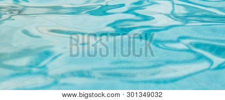 Aqua Water Blur Background Of Wavy Rippled Swimming Pool Clean Fresh Water Wave In Light Cool Cyan T