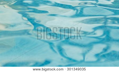 Aqua Water Blur Background Of Wavy Rippled Swimming Pool Clean Fresh Water Wave In Light Cool Cyan T