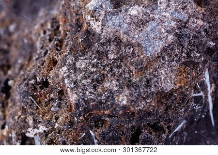 Stone Macro Mineral Ilmenite On A White Background