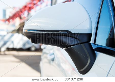 Left Side. Rear View Mirror Cover With Surround View 360 Degrees Camera. On A White Premium Suv. Par