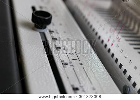 Bookbinding Machine. Printing Equipment. Industrial Tool.  Macro.