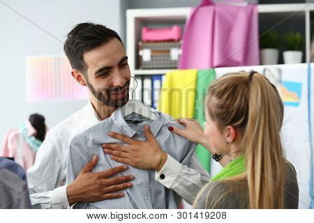 Assistant Buyer Fashion Tailor Profession Concept. Blond Woman Standing Near Male Client Fitting On 