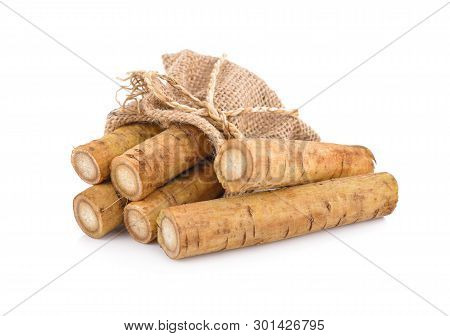 Fresh Burdock Root Or Gobo In Sack And On White Background