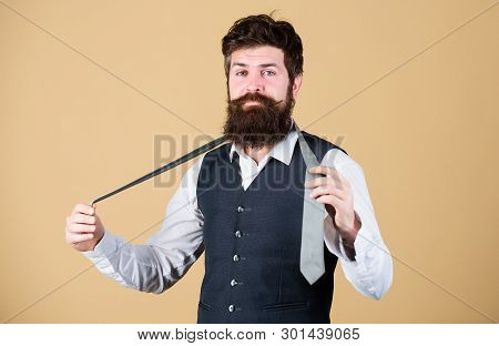 Art Of Manliness. Man Bearded Hipster Try To Make Knot. Different Ways Of Tying Necktie Knots. How T