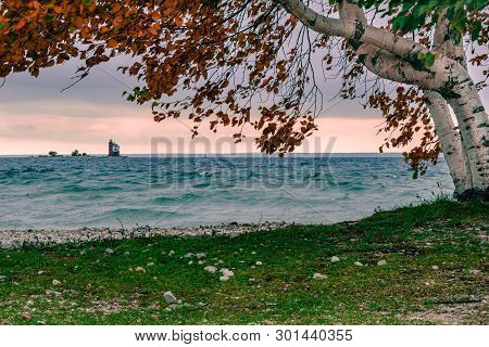 A Windy Fall Day On Mackinac Island, Looking Out At Round Island Lighthouse, With A Little Bit Of Su
