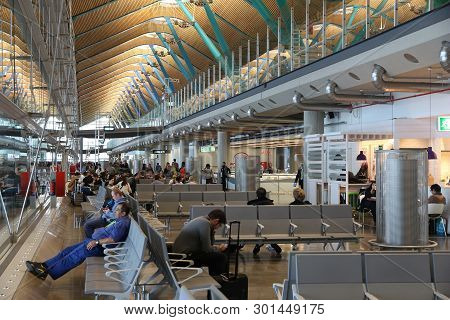 Madrid, Spain - November 20, 2016: People Wait At Terminal T4 Madrid Barajas Airport In Spain. It Is