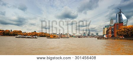 London, Panoramic View Over Thames River From Waterloo Bridge On A Gloomy Overcast Day In Fall. This