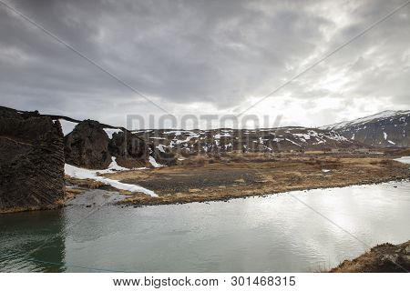 The Foss River Flows Through The Scenic Icelandic Landscape