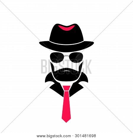 Bearded Man In A Hat And In Sunglasses. Gentleman Logo In Mafia Style For Male Store, A Barber Shop.