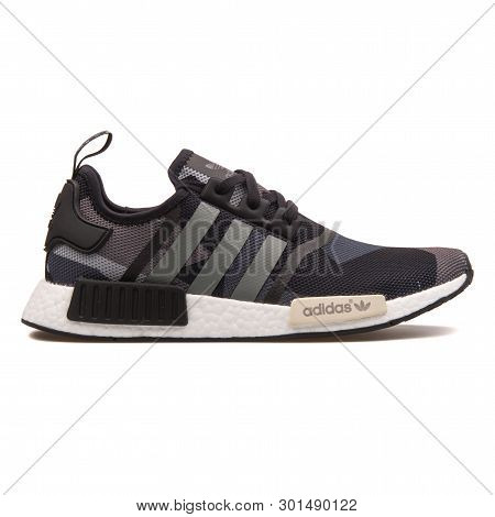 Vienna, Austria - August 10, 2017: Adidas Nmd R1 Black Sneaker On White Background.