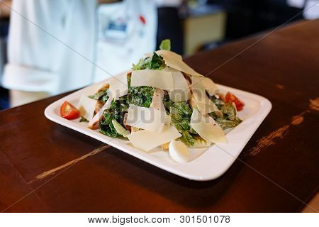 Caesar Salad Without Chicken, Brut Salad On A Wooden Table