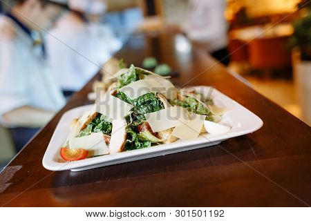 Caesar Salad Without Chicken, Brut Salad On A Wooden Table
