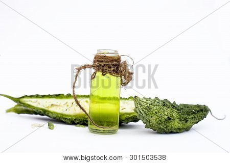 Raw Organic Bitter Melon Or Bitter Cucumber Or Bitter Gourd Isolated On White Along With Its Detoxif