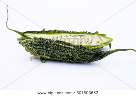 Raw Organic Bitter Melon Or Bitter Cucumber Or Bitter Gourd Isolated On White.