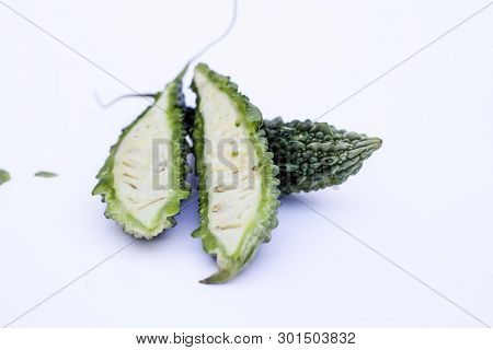 Raw Organic Bitter Melon Or Bitter Cucumber Or Bitter Gourd Isolated On White.