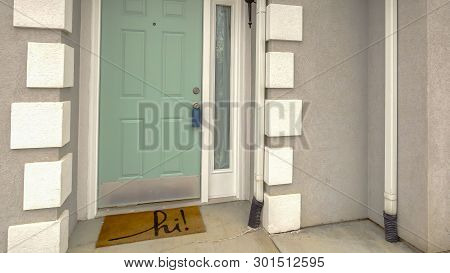 Panorama Green Front Door With Sidelight On The Facade Of Home Viewed Against Cloudy Sky