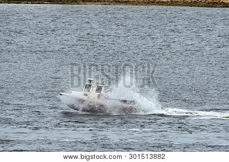 New Bedford, Massachusetts, Usa - May 13, 2019: Lobster Boat Banging Through Wake On Its Way Across 