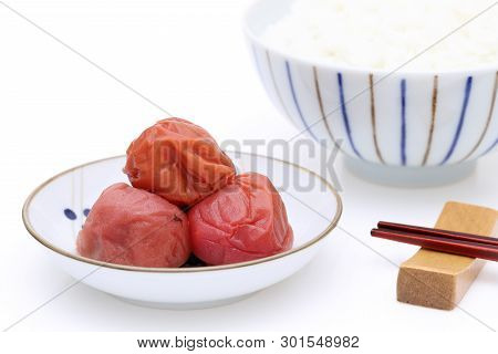 Japanese Food, Pickled Umeboshi With Cooked Rice On White Background