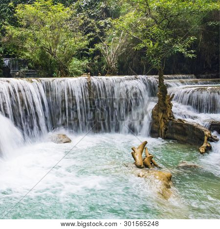 The Kuang Si Falls Or Known As Tat Kuang Si Waterfalls. These Waterfalls Are A Favorite Side Trip Fo