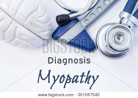 Diagnosis Of Myopathy. Anatomical Brain Figure, Neurological Hammer And Stethoscope Lying On Sheet O