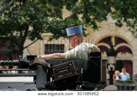 France, Paris - July 14, 2014: Participants and spectators at the parade in honor of the Bastille Da