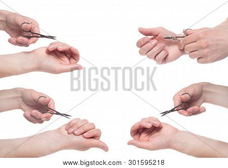 Hand Holding Scissors For Manicure Isolated On White Background. Health And Personal Care Conception