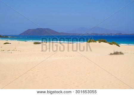 Sand Dunes And Beach In National Park Corralejo, Fuerteventura, Canary Islands, Spain.