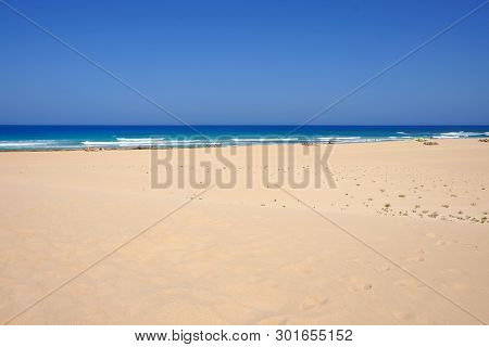 Sand Dunes And Beach In National Park Corralejo, Fuerteventura, Canary Islands, Spain.