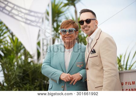 Elton John and David Furnish attend the photocall for 