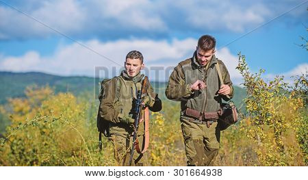 Army Forces. Camouflage. Military Uniform. Man Hunters With Rifle Gun. Boot Camp. Hunting Skills And