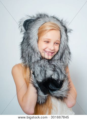 Fur Fashion. Small Fashionista. Small Girl Wear Winter Hat Scarf. Happy Child Smile In Fashion Style