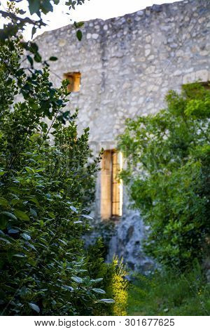 Medieval Castle Ruines In Provence During Sunrise, South Of France, Vacation And Tourist Destination