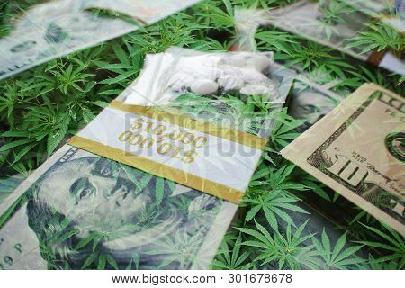 Drug Money Concept With Stacks Of Money, Pills & Marijuana Leaves High Quality