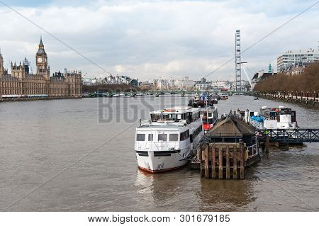 Various Boats On Thanes River In London Near Vauxhall Bridge