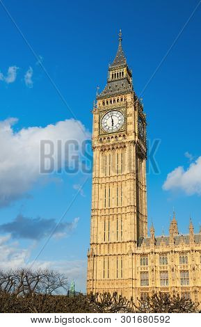 Big Ben Tower In London With Blue Sky And Clouds Behing