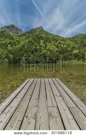 Jetty In Myojin Pond At Hotaka Rear Shrine In Kamikochi, Nagano, Japan.