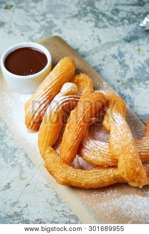 Churos Spanish Dessert. Gray Textured Background. Beautiful Serving Dishes. Dessert. Food Chain