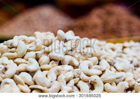 Heap Of Cashew Nuts With Blurred Background Ready For Sale